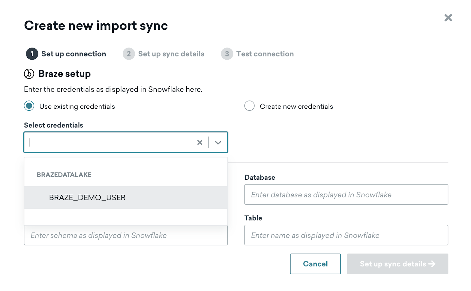 The "Create new import sync" page for Snowflake in the Braze dashboard, with the "Select credentials" dropdown open in Step 1: "Set up connection".